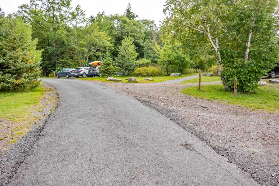 The intersection of the old railroad bed and the service road to north-south lake campgrounds