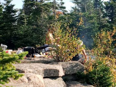 A pair of hikers camp and have a campfire on summit of Wittenberg Mountain August 20, 2022.