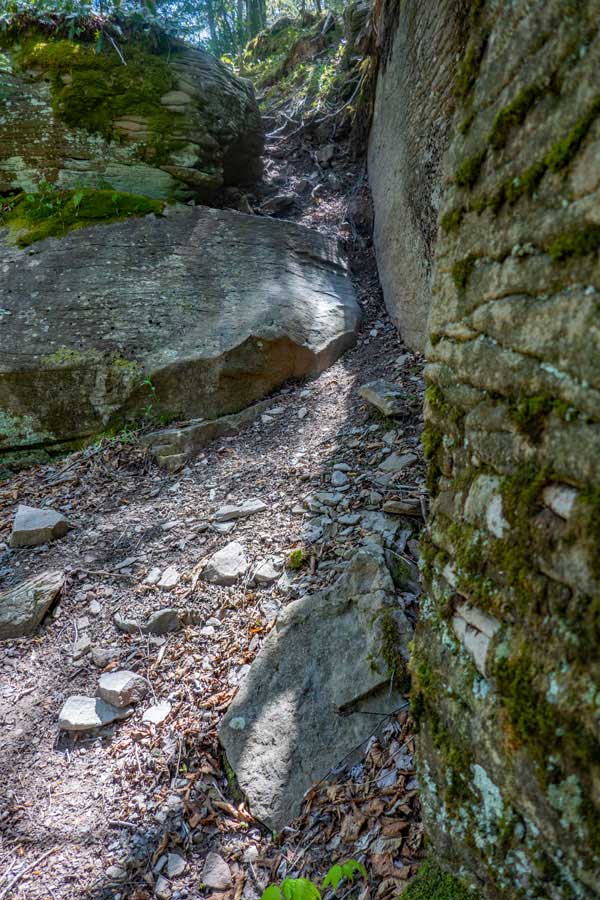 As the path turns to the east again, you will have to climb up a small ledge.