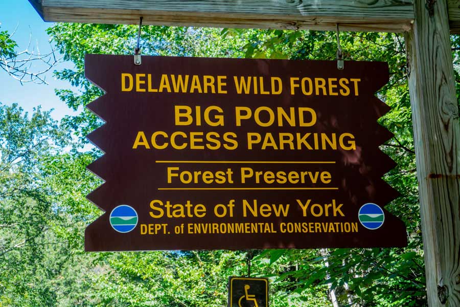 DEC sign for the Big Pond Parking Area and trailhead to the Touch-Me-Not Trail