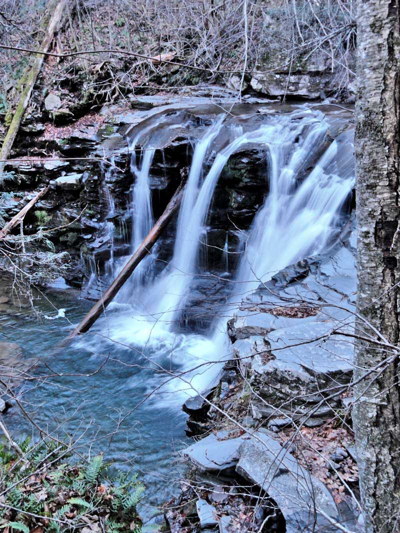 view of delmura waterfalls from the side
