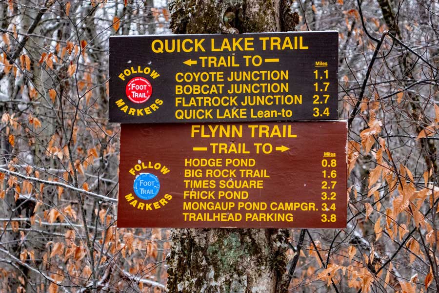 DEC Trail sign at Junkyard Junction on the Quick Lake Trail